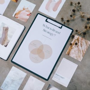 pexels-photo-7598024-7598024 Aesthetic flat lay of branding and design documents on textured surface.